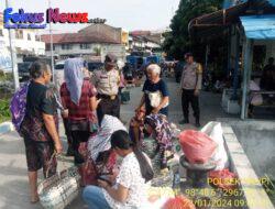 Polsek Palipi Menyapa Pedagang, Pembeli dan Penumpang Kapal Cegah Tindak Pidana