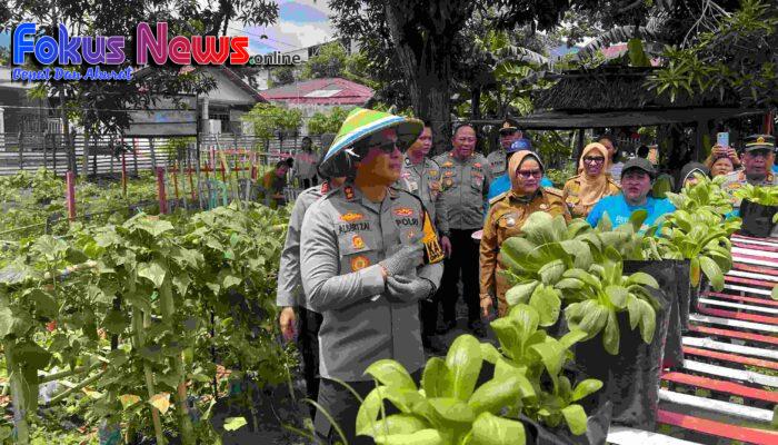 Dukung Asta Cita Presiden RI  Pertahanan Pangan Bergizi, Kapolres Bitung Bagi Bibit dan Panen Sayur Bersama KOPTAN ” Sampuhe”